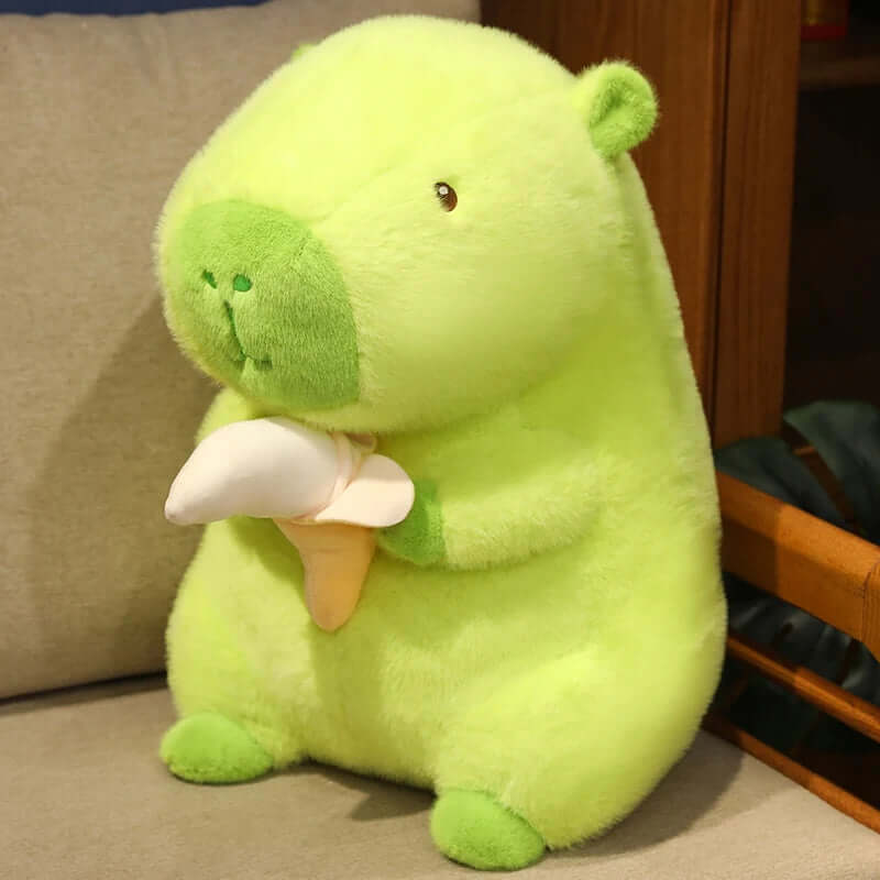 Green capybara plush with banana